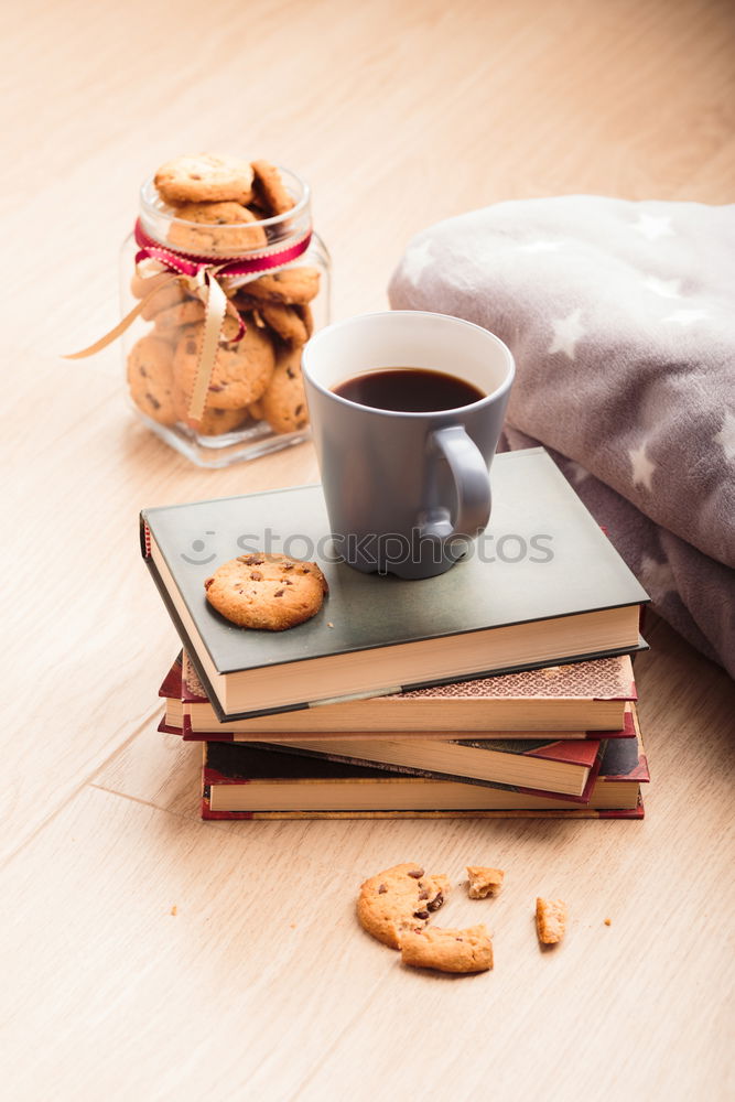 Similar – Image, Stock Photo A few books with cup of coffee and cookies on wooden floor