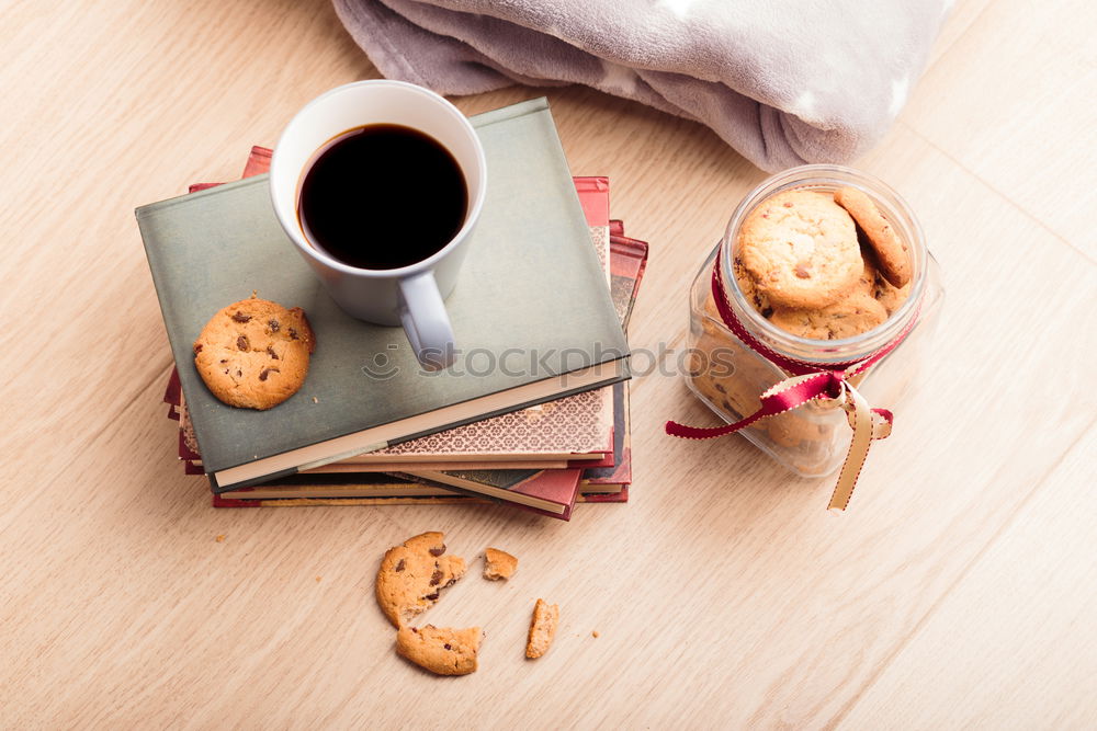 Similar – Image, Stock Photo A few books with cup of coffee and cookies on wooden floor