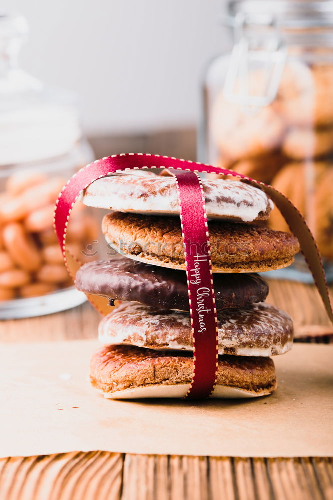 Similar – Gingerbread cookies in jars on wooden table