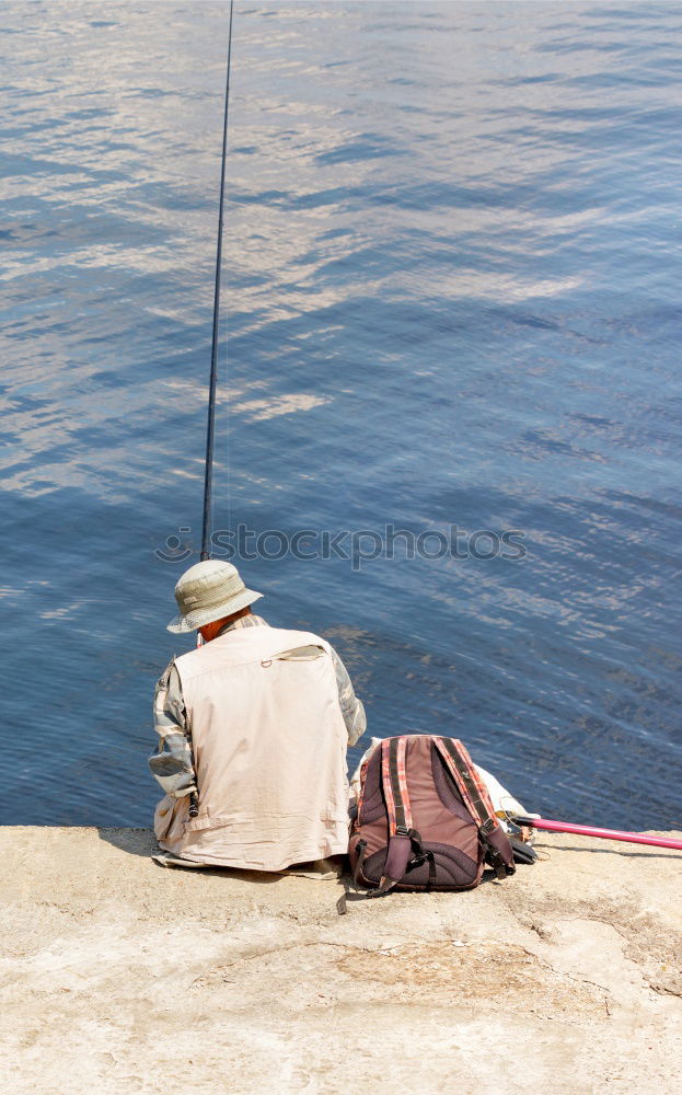 Similar – Man on fishing with rod