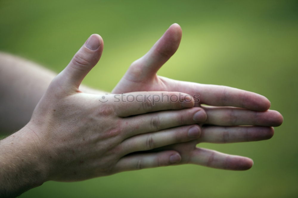 Similar – Child and senior man hands giving five in the nature