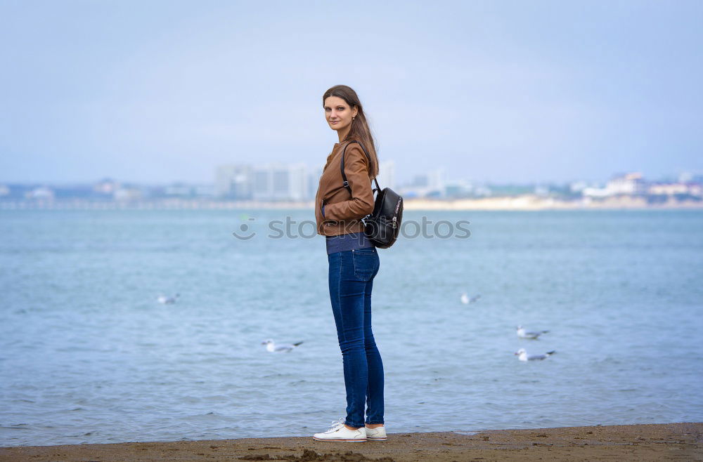 Similar – Girl posing in the sunset