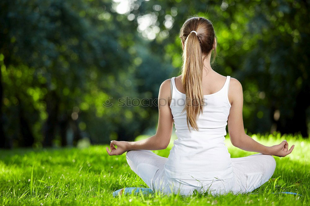 Similar – Image, Stock Photo Mother and daughter doing yoga exercises on grass in the park at the day time