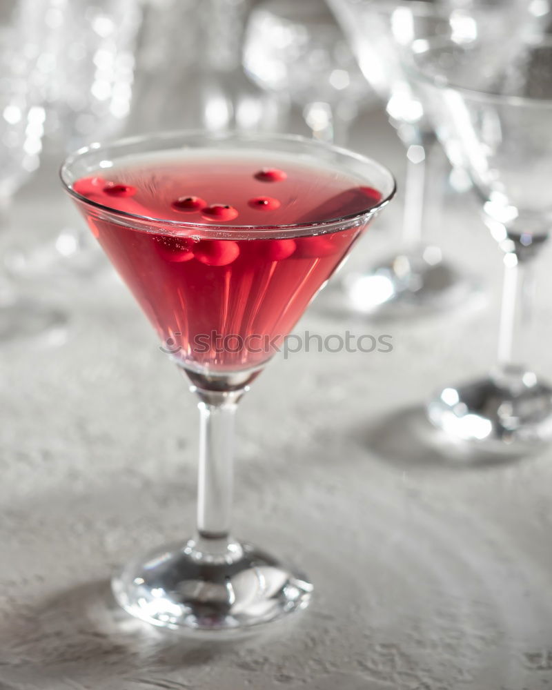 Similar – Hot spicy  cocktail in martini glass