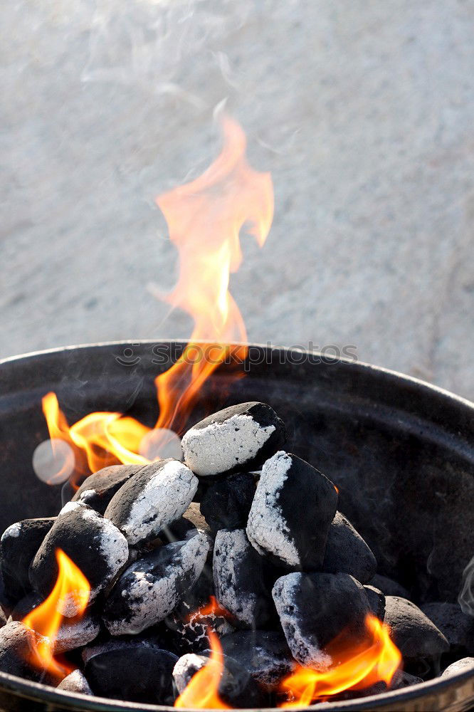 Similar – Hot coals with smoke in grill