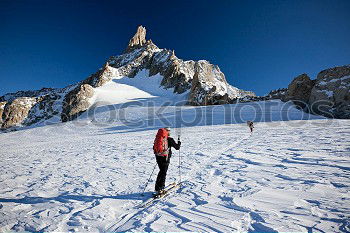 Similar – ski tour Ski tour