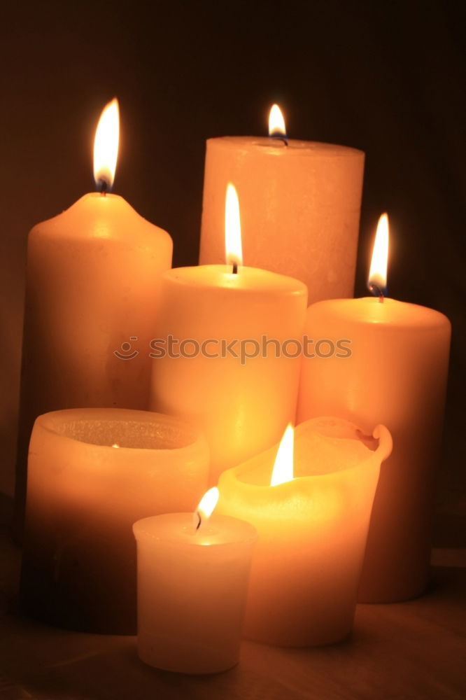 Similar – Many colourful burning candles