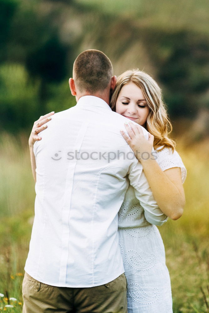 Similar – Image, Stock Photo Sensual wedding couple kissing on shoreline