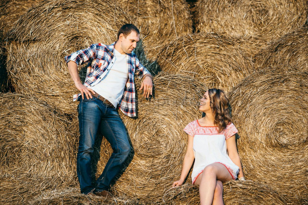 Similar – Image, Stock Photo Young couple in front of a wooden hut in traditional costume