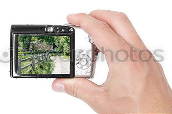 Similar – Full body image in the ground glass of an analog medium format camera of a tall beautiful woman with long dark curly hair in nature sitting barefoot under a tree