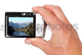 Similar – Full body image in the ground glass of an analog medium format camera of a tall beautiful woman with long dark curly hair in nature sitting barefoot under a tree