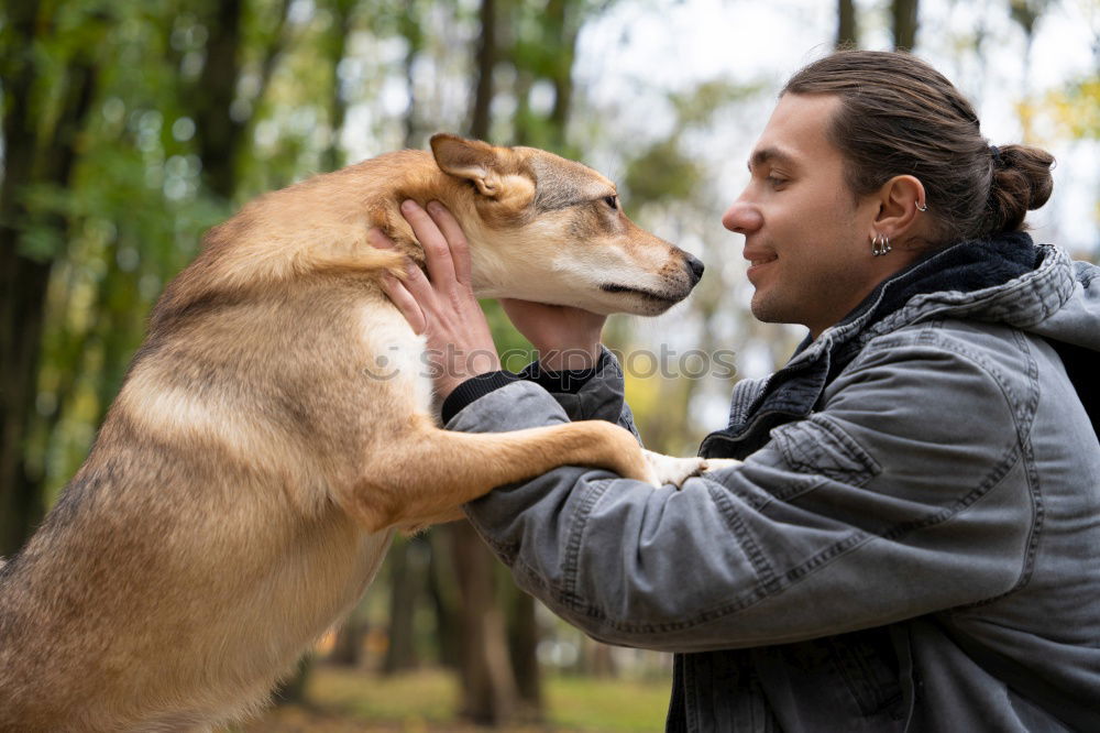 Similar – Woman with dog in the city