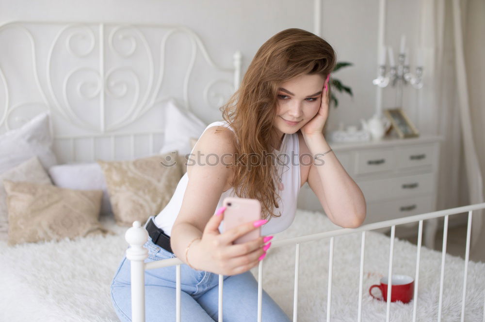 Similar – Image, Stock Photo Teenage girl listening to music and chatting with friends on smartphone sitting in hammock at home