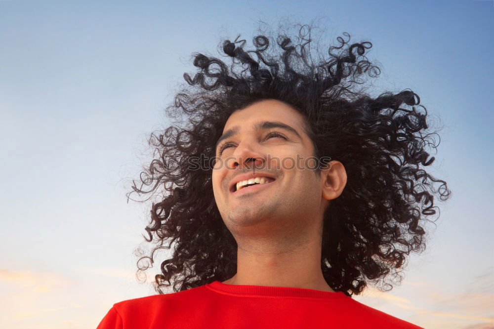 Similar – Image, Stock Photo A portrait of a young man with long hair, a beard and a kind smile on his gace