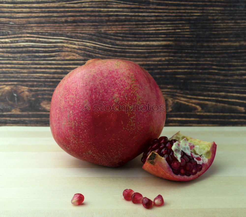 Similar – Pomegranate on vintage wooden table