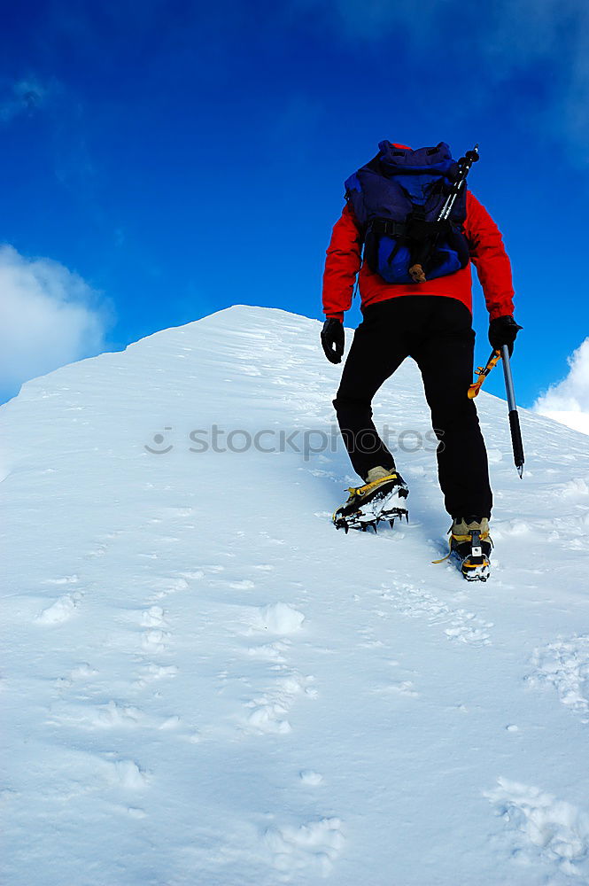 Similar – Image, Stock Photo Mountaineer climbs a snowy peak.