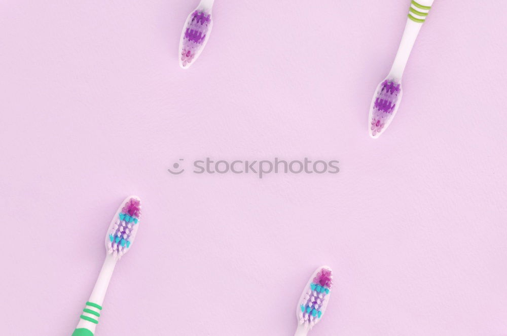 Similar – Plastic fork pattern on pink background