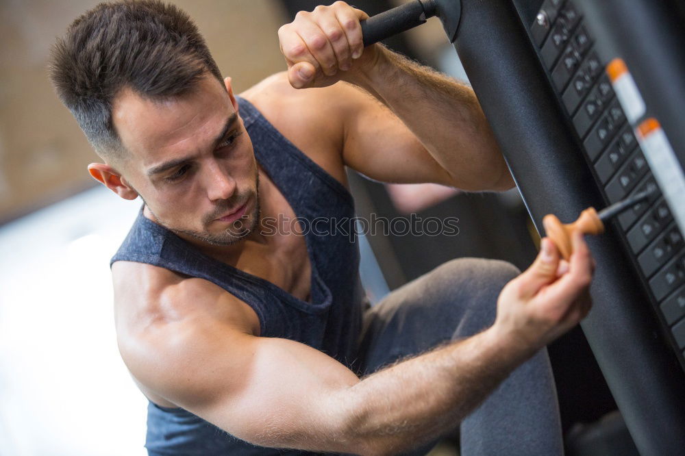 Similar – Image, Stock Photo Man stretching and woman doing dumbbells exercises in gym