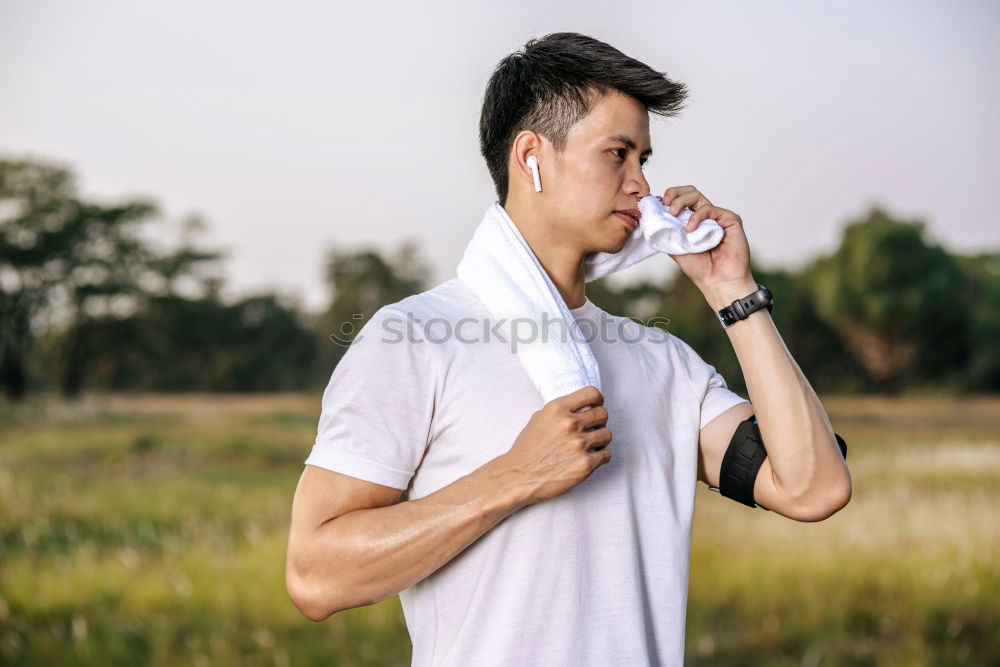 Similar – Image, Stock Photo Young bearded man drinking bottled water