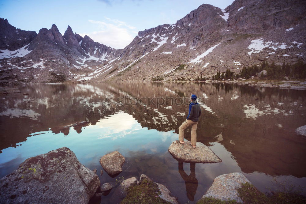 Similar – Image, Stock Photo Two hiking backpacks in front of an evening mountain panorama