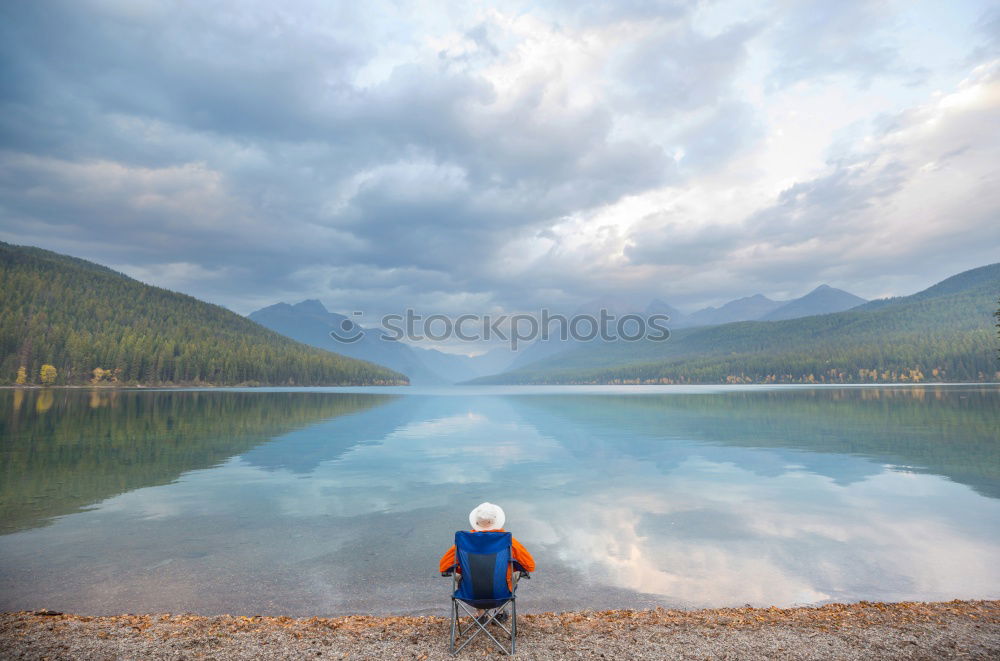 Similar – Image, Stock Photo Woman on a deck over an alpine lake