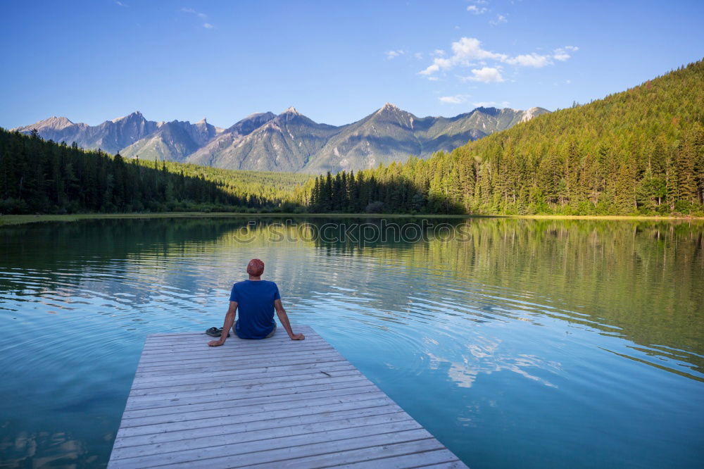 Similar – Image, Stock Photo Woman sitting at lake Lake