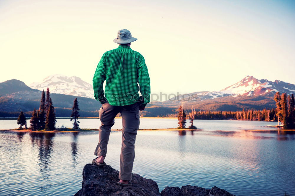 Similar – Tourist man at lake Man