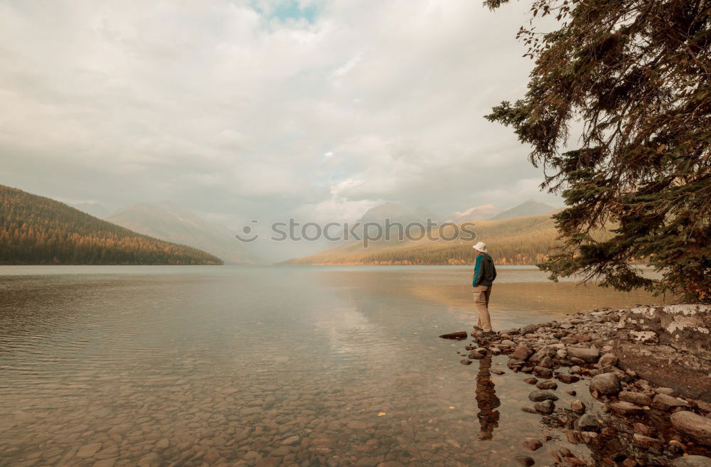 Similar – Image, Stock Photo Man with backpack on trunk