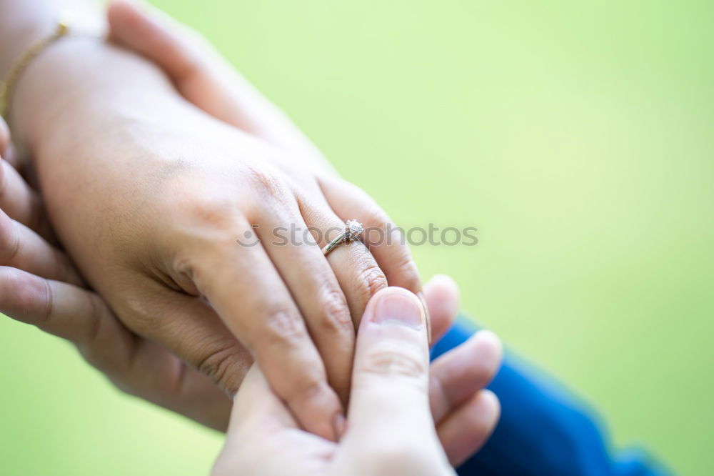 Similar – Baby girl, child and senior man comparing hands size