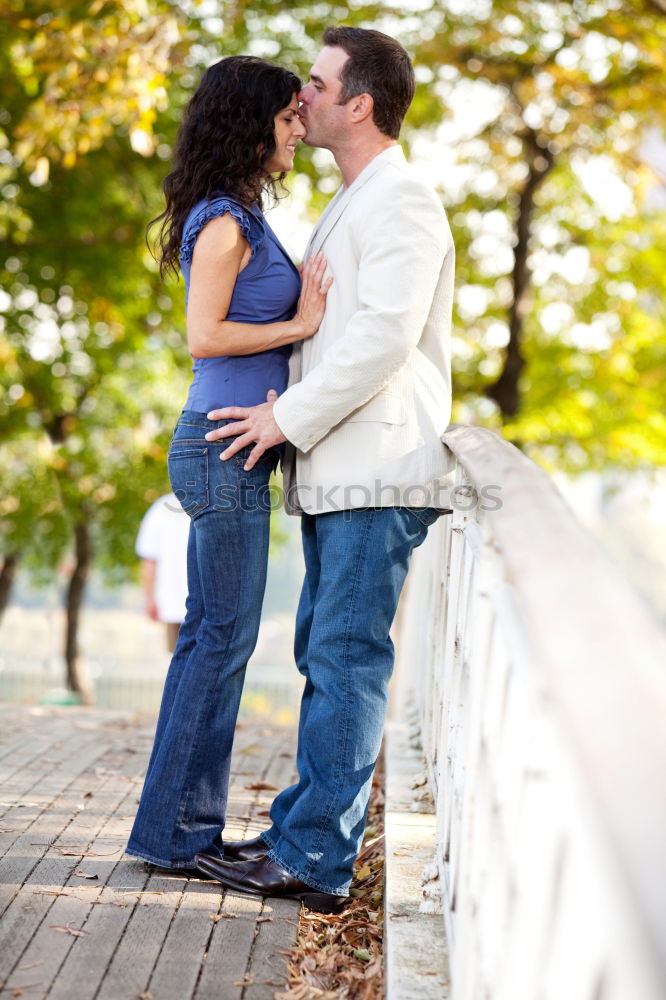 Similar – Image, Stock Photo Smiling couple of lovers having fun.