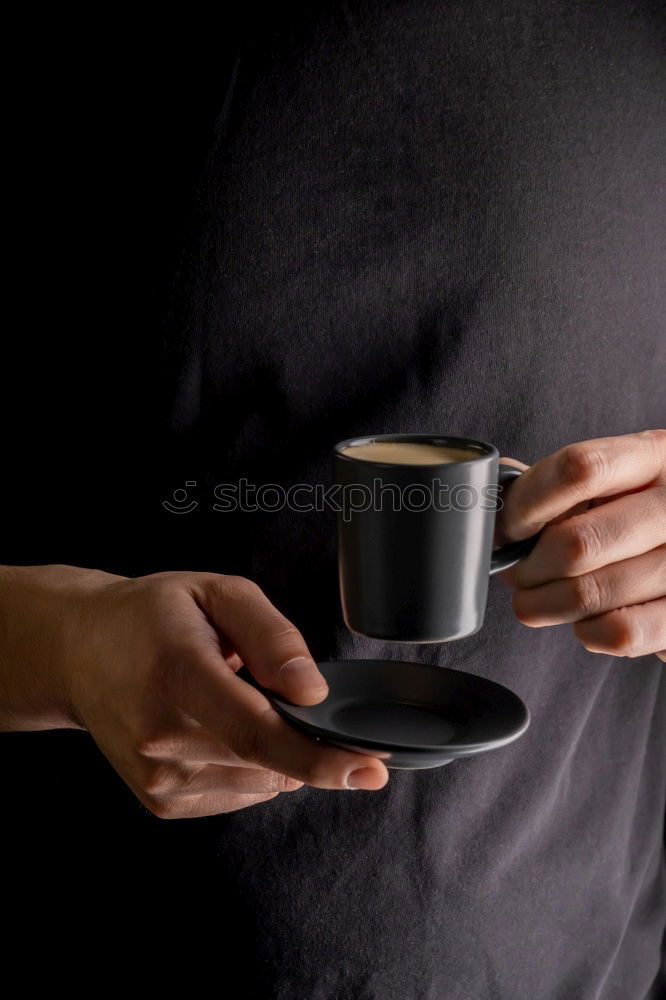 Similar – Hands with coffee cups on table in a urban cafe.