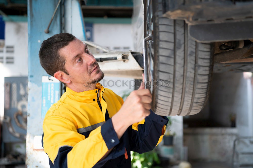 Similar – Professional Car Mechanic working.