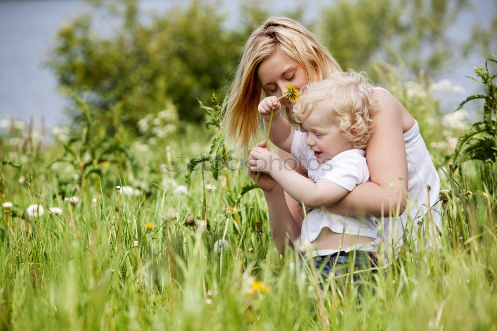 Similar – mother and little girl playing in the park