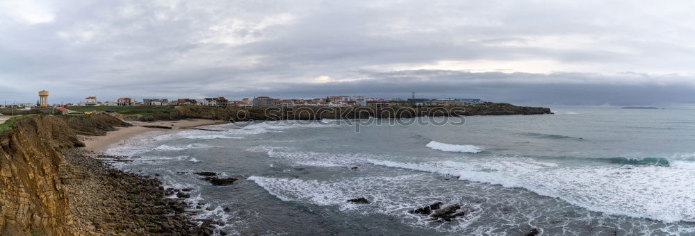 Similar – Scenic aerial view of city on ocean shore