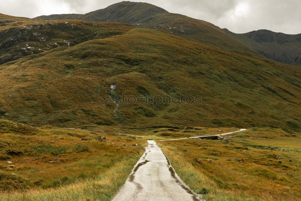 Similar – Fence on road in hills