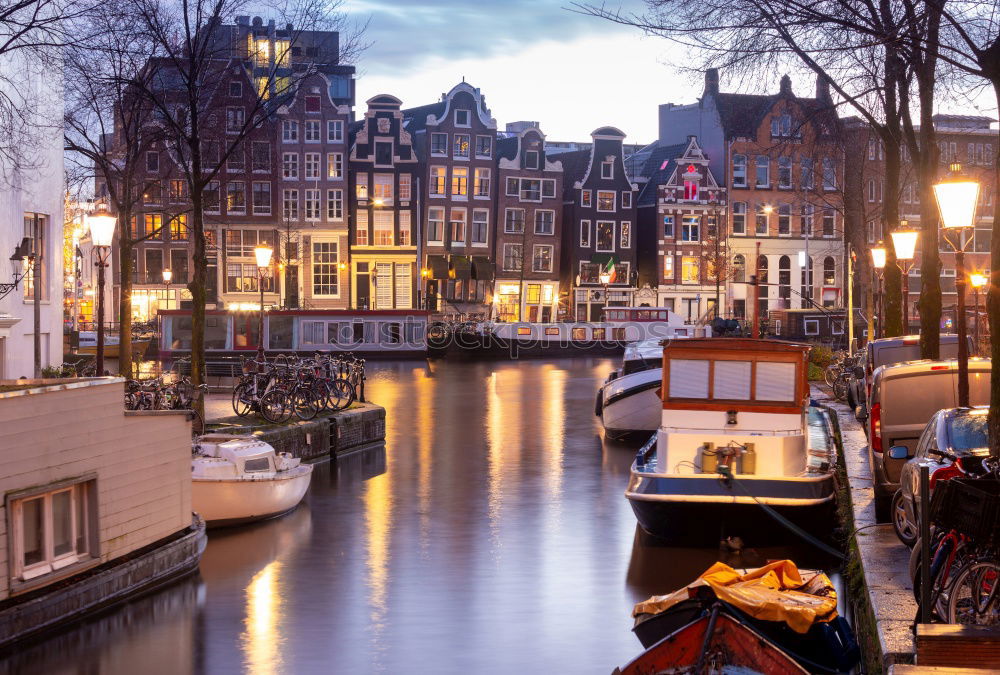 Image, Stock Photo Woman looking at sunset at one of the canals in Amsterdam