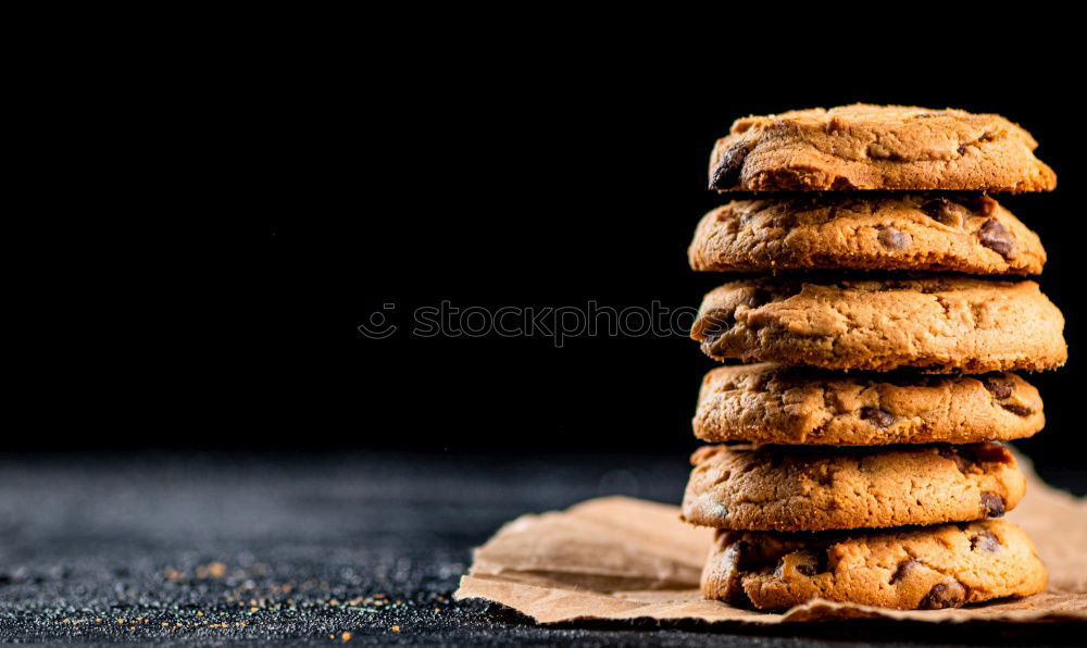 Similar – Image, Stock Photo A few gingerbread cookies wrapped in red ribbon Happy Christmas