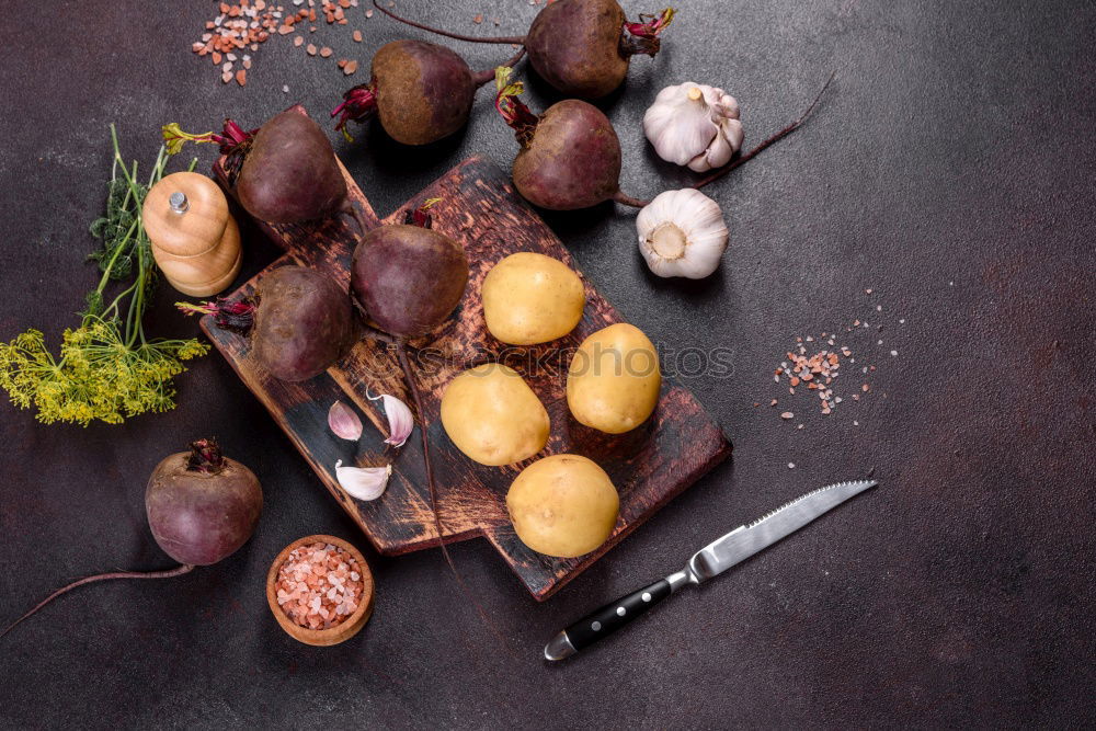 Similar – Image, Stock Photo Potatoes with rosemary, garlic and spices, ingredients