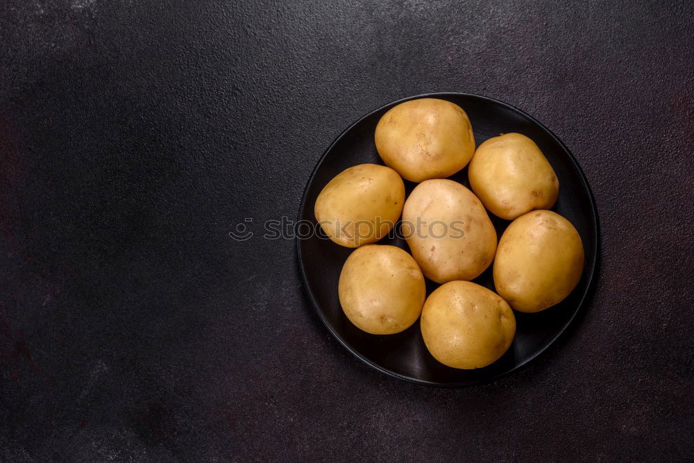 Similar – Boil young potatoes Food