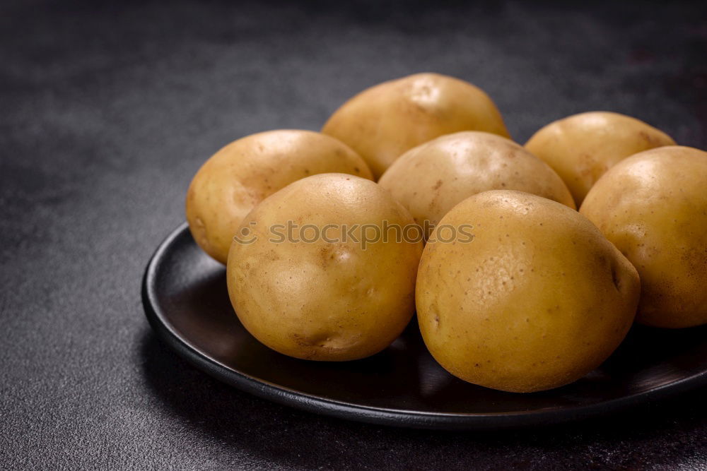 Similar – Boil young potatoes Food