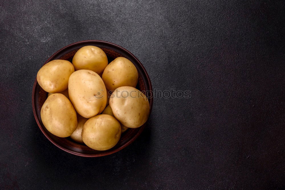 Similar – Image, Stock Photo fresh ripe yellow pears on a brown wooden table