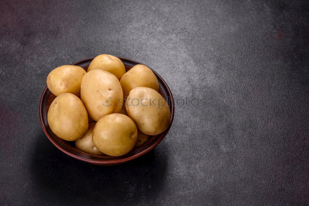 Similar – Boil young potatoes Food