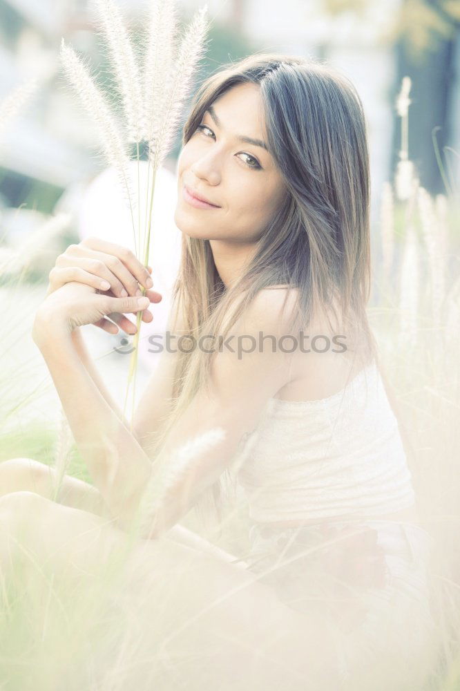 Similar – Image, Stock Photo sports woman doing lawn exercises and stretching on the grass outdoor in a park listening music