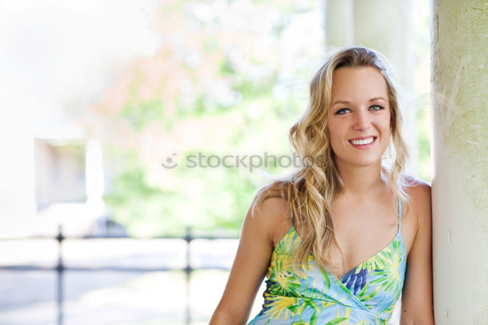 Similar – Smiling young woman in urban background.