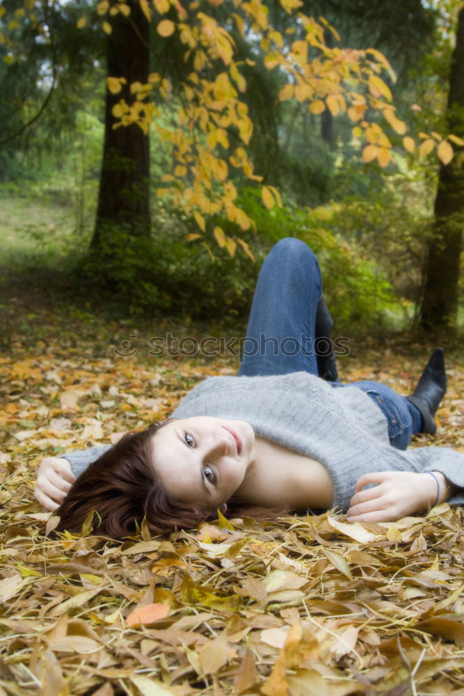 Similar – woman sitting with her dog on a bench