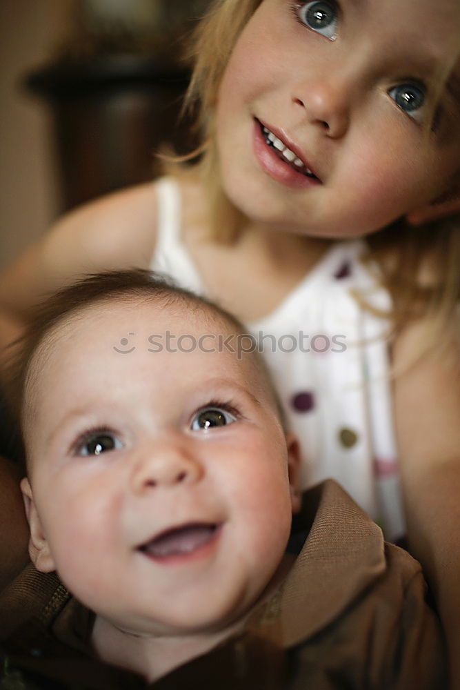 Similar – Image, Stock Photo Mother holding kid on hands in park