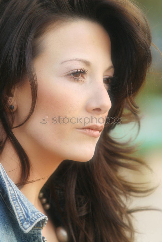 Similar – Young woman with freckles sits on a high flat roof in the evening light and smiles at the camera