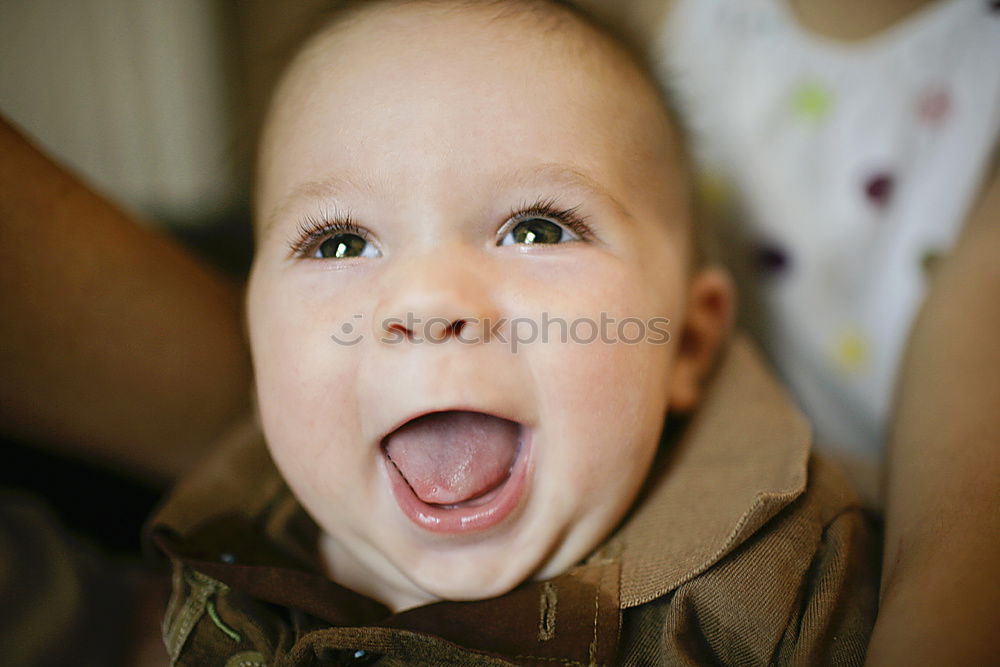 Similar – Boy sticks out his tongue