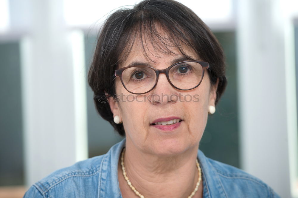 Similar – Foto Bild Portrait einer Frau mit Kurzhaarfrisur und Brille