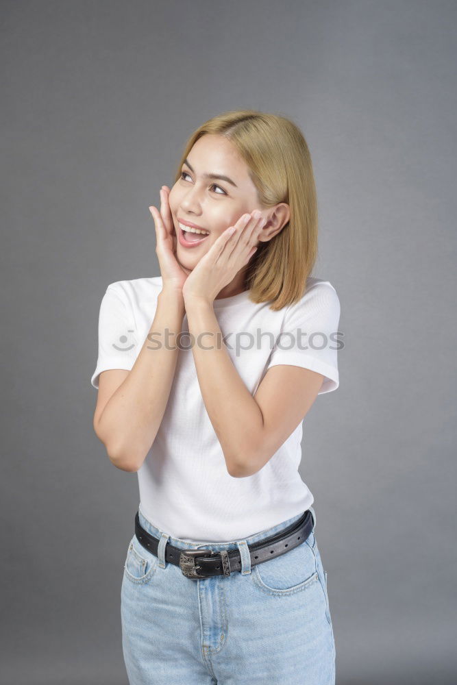 Similar – Portrait of a young blonde woman gesturing